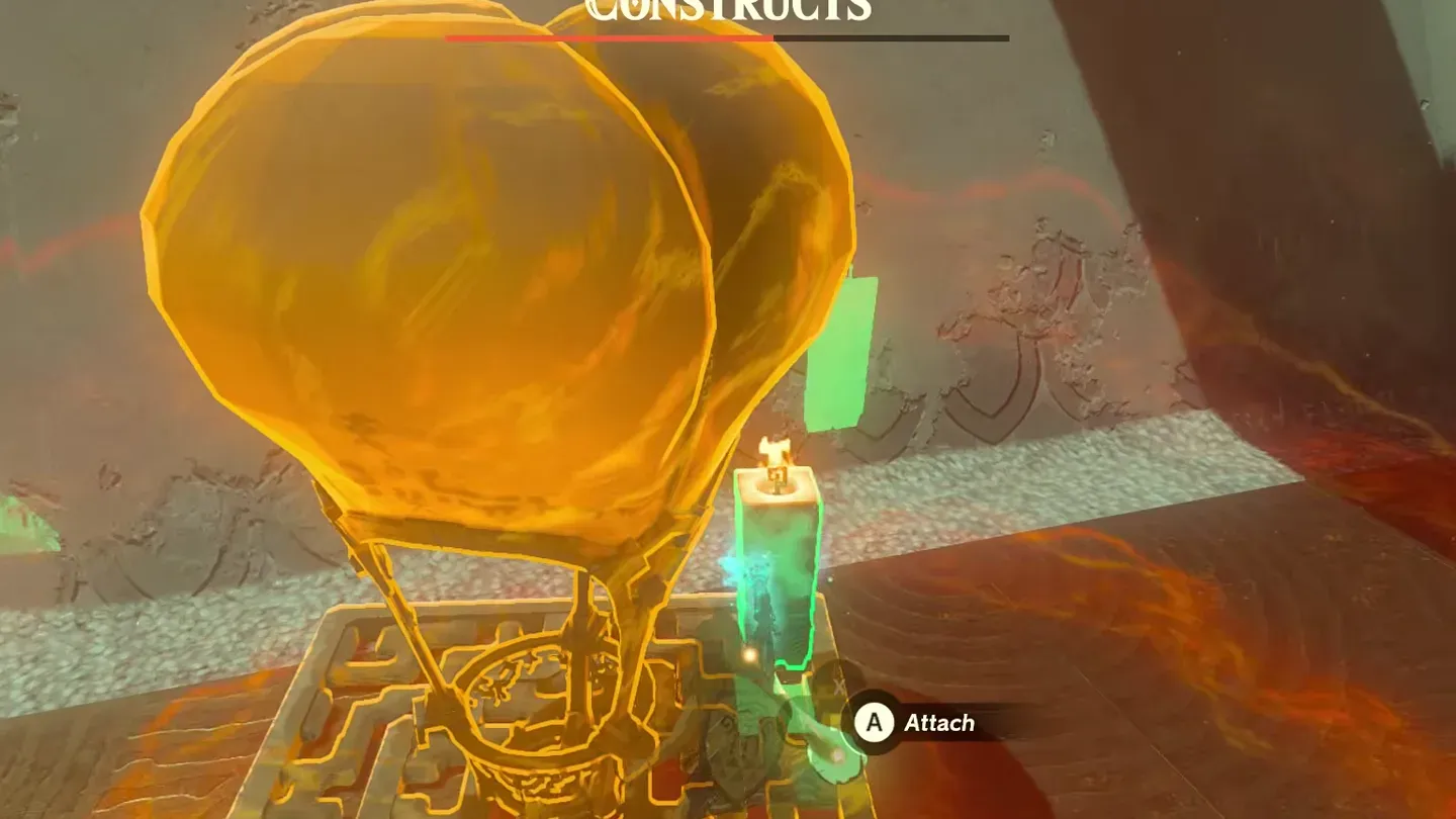 Ultrahand attaching a lit candle under the hot-air balloon