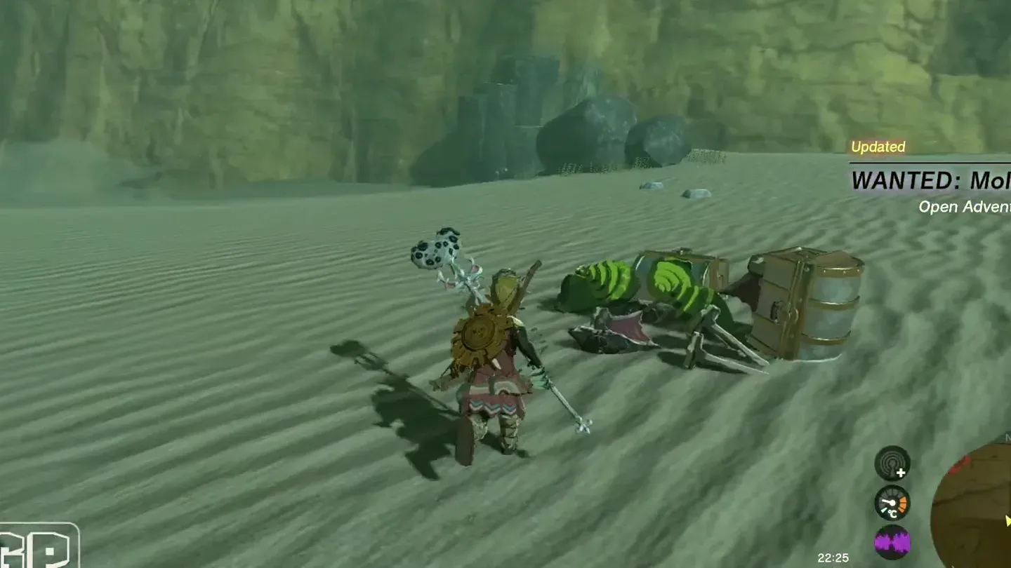 Molduga Guts, a jaw and a chest lying on the sand after the fight
