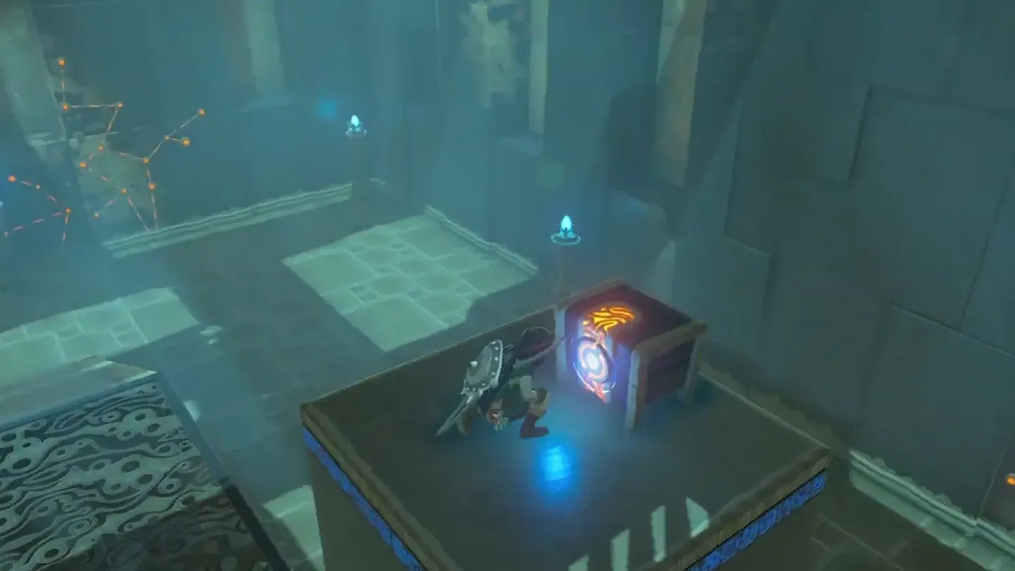 Link opening the treasure chest on top of the pillar
