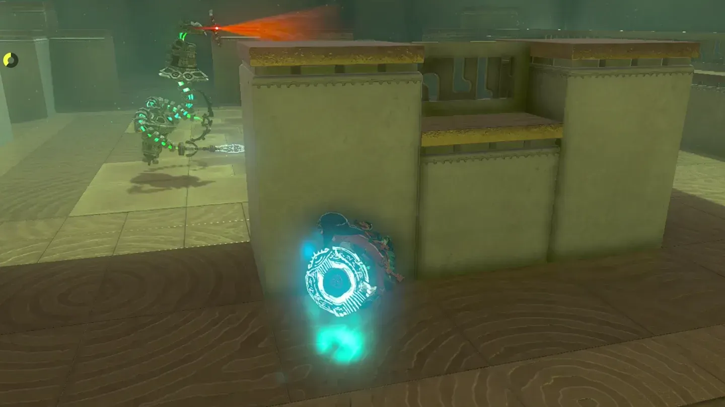 Link crouched by the wall watching the patrolling Construct