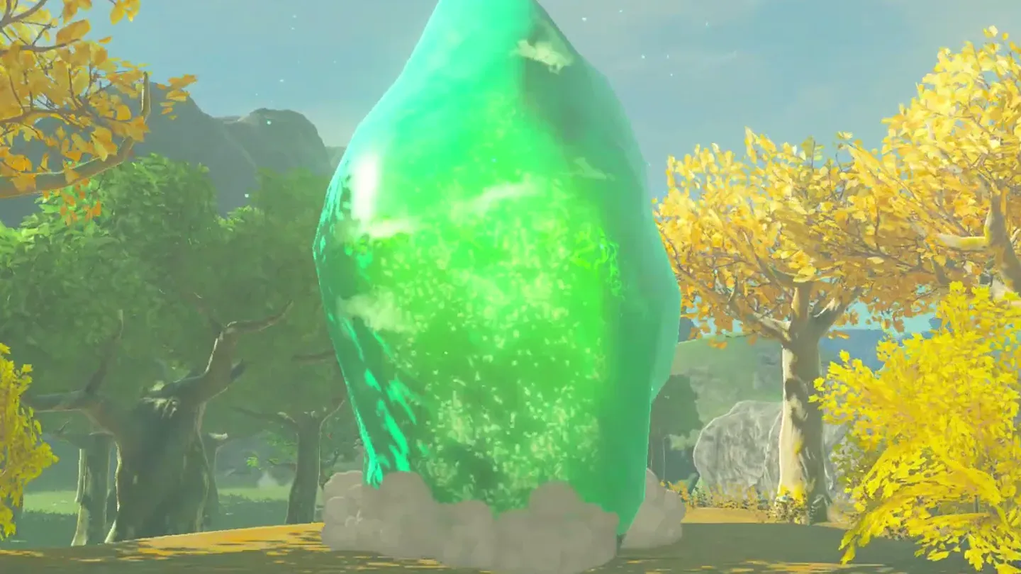 A huge green crystal rising among autumn trees
