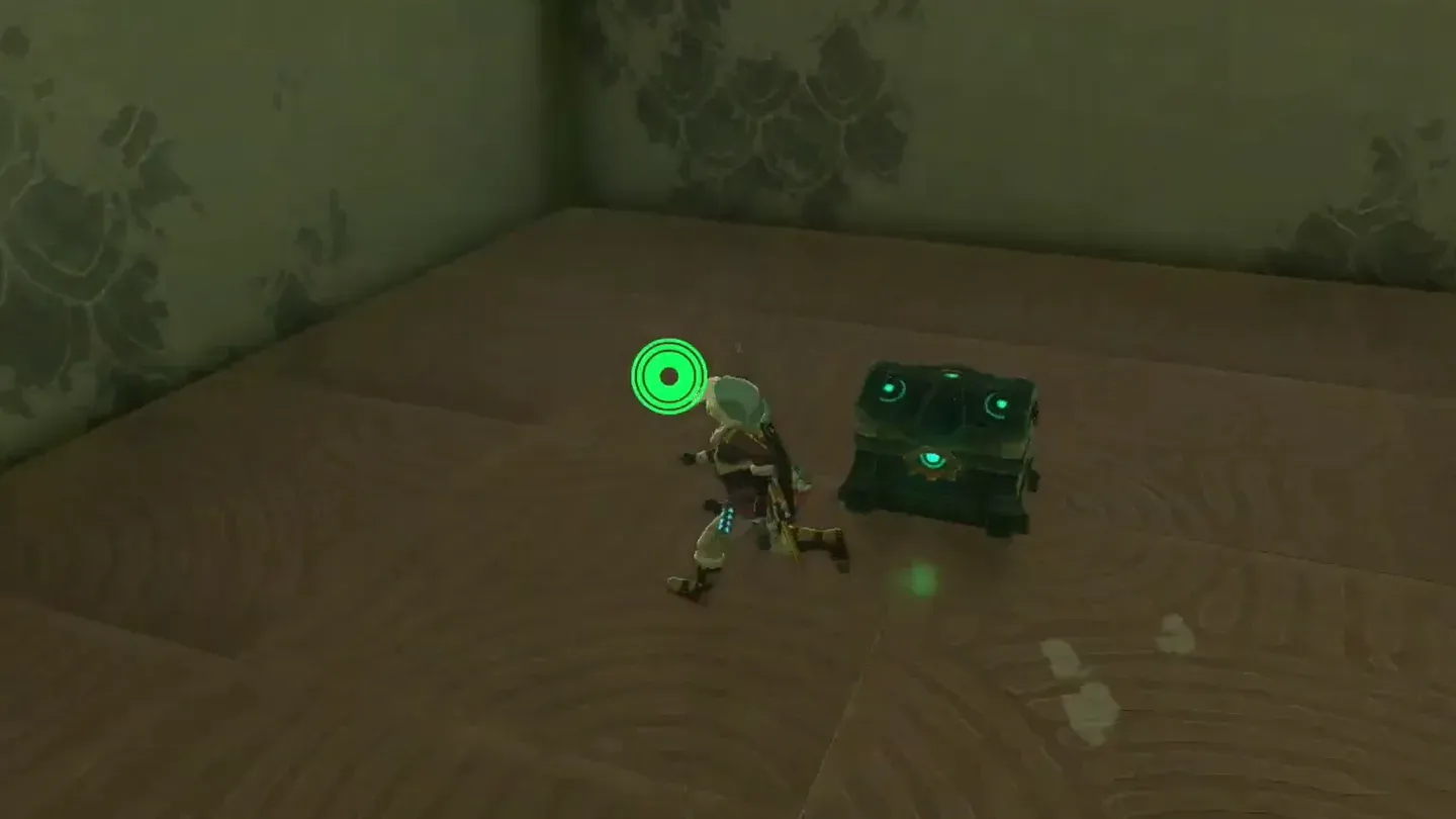 Link beside the chest on top of the pillar