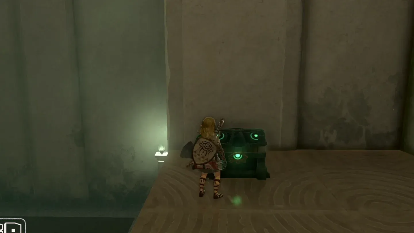 Link beside the second chest in the small room above
