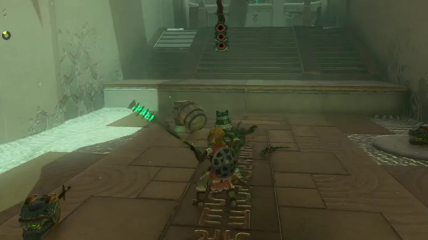 The defeated Captain Construct I breaks apart into pieces on the floor near some stairs.