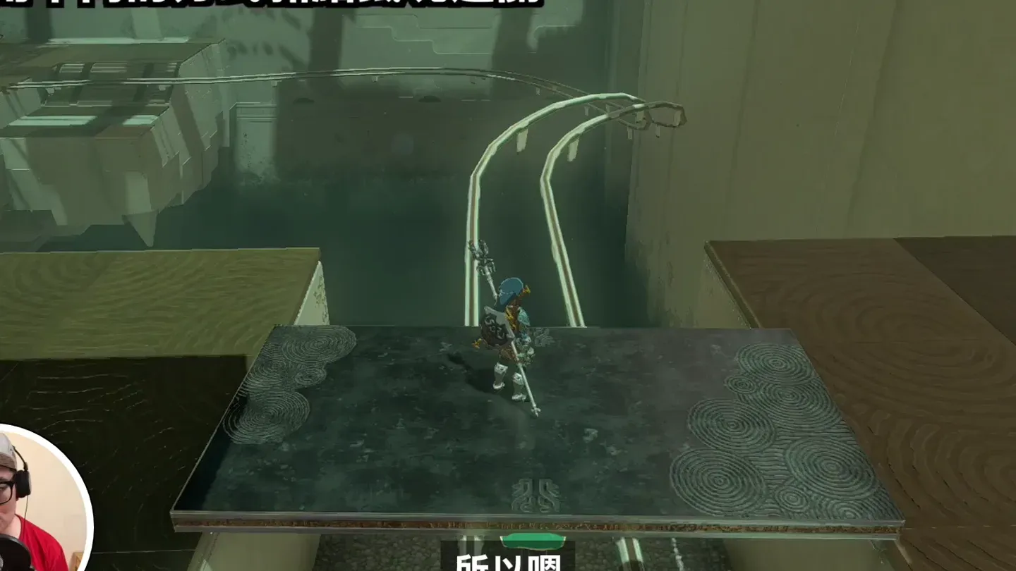 Link standing on top of the T as it rides the rails