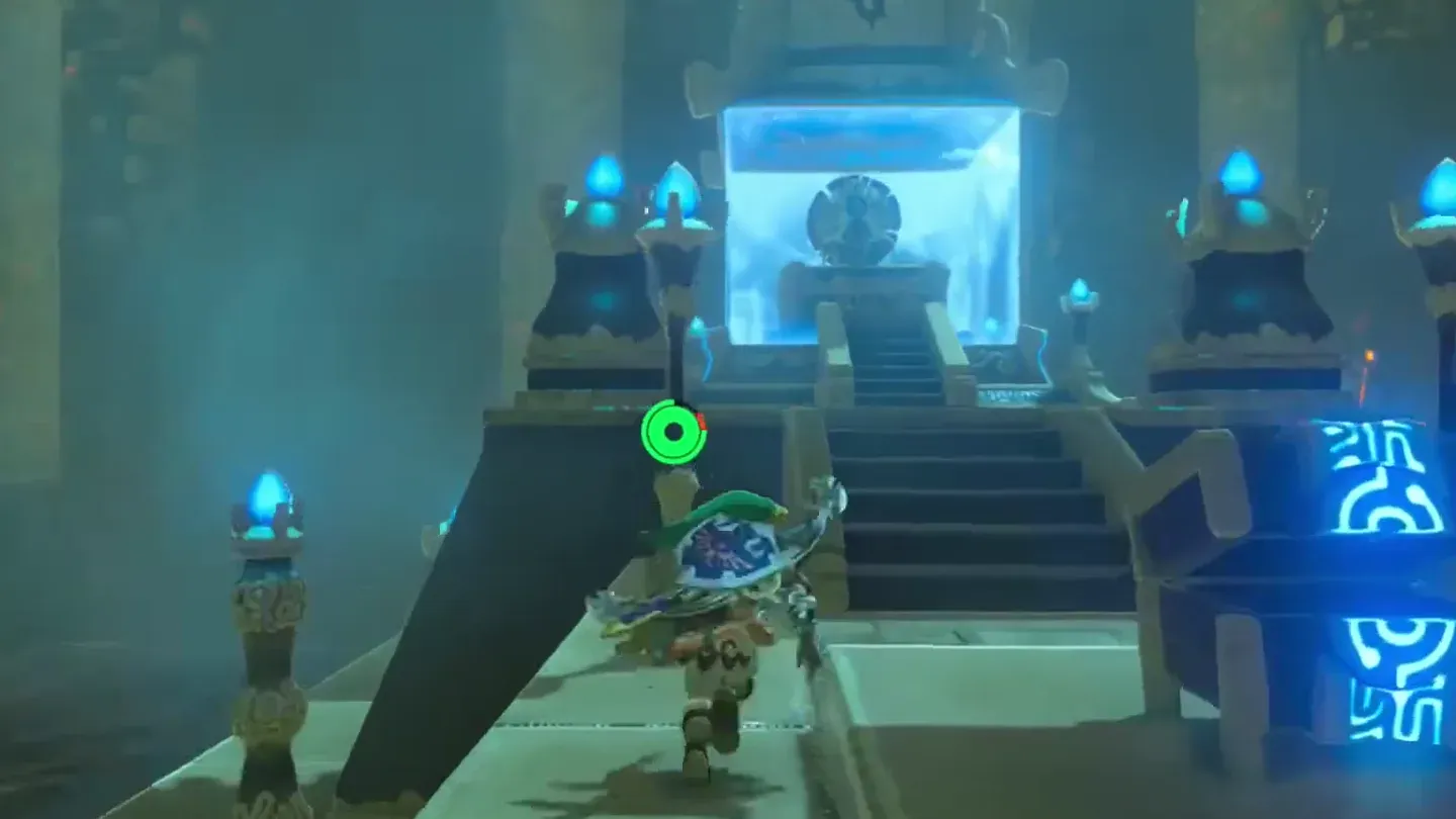 Link walking on past the opened stone chest