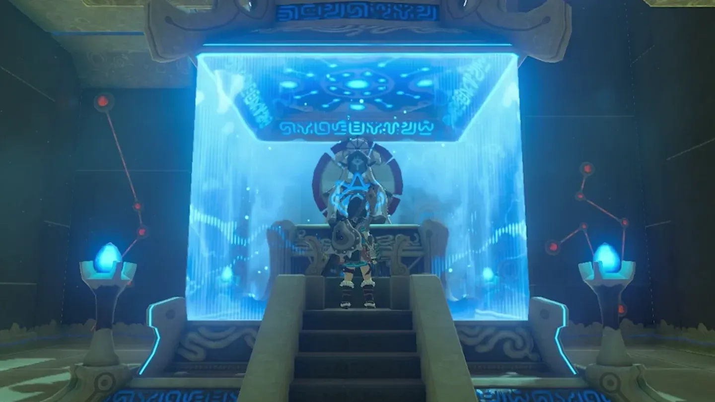 The monk seated behind a glowing blue barrier
