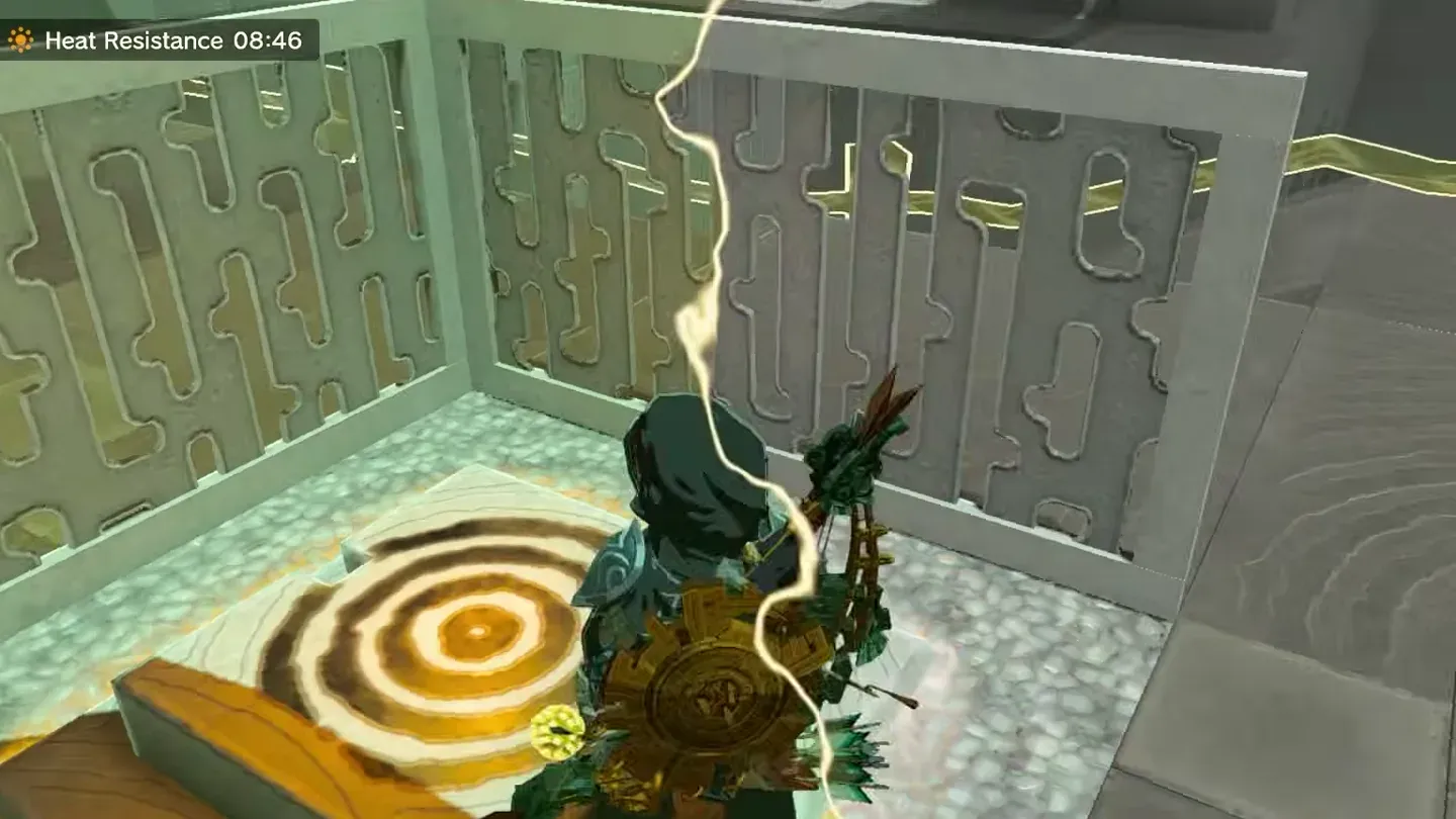 Link stepping onto the round floor switch inside the fenced corner