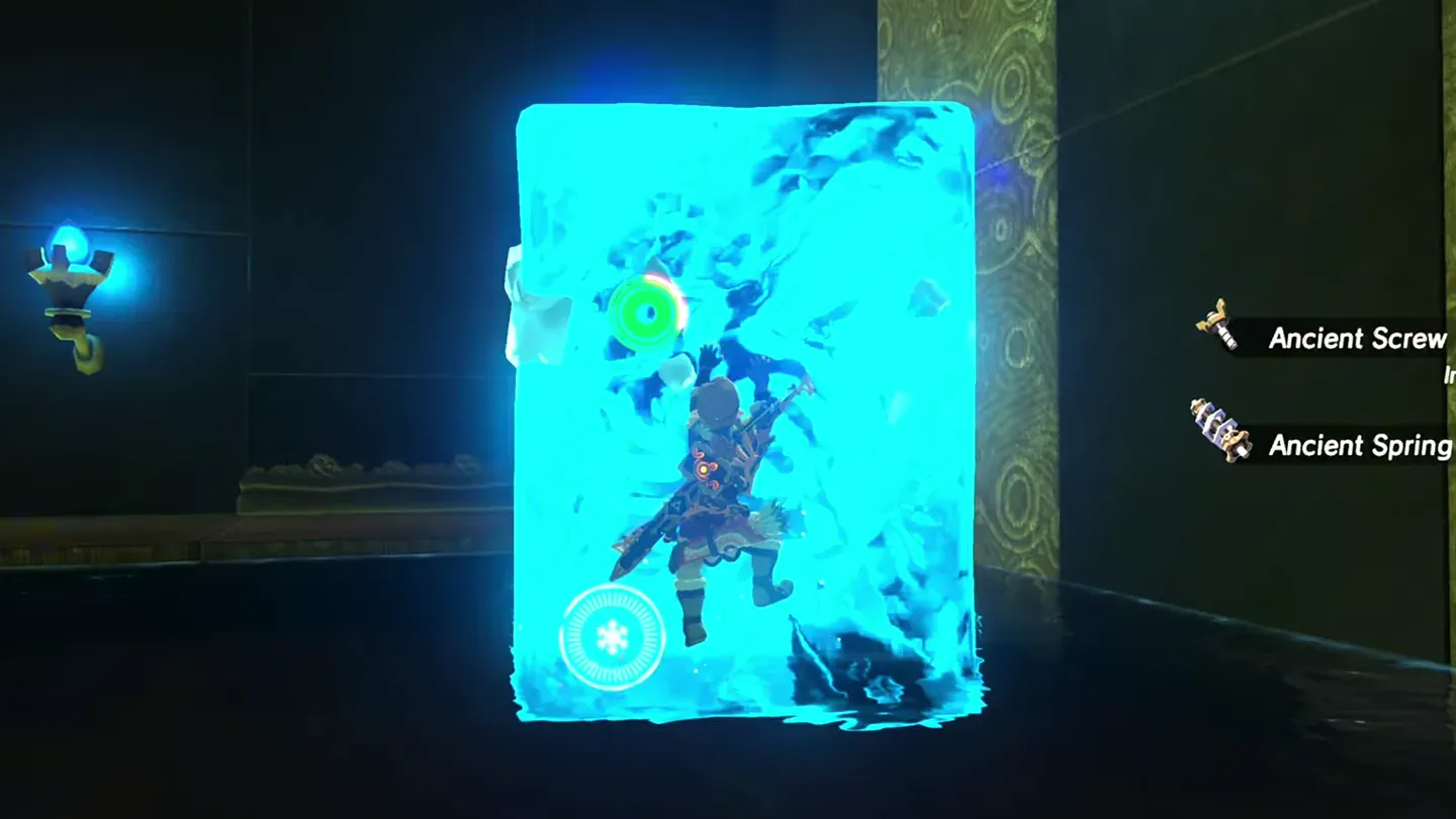 Link climbing a tall ice pillar raised from the water