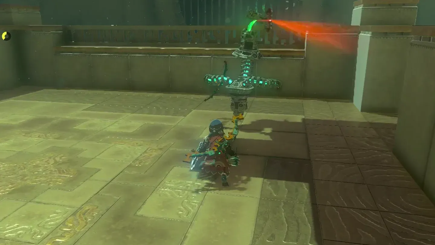 Link crouched behind the patrolling Construct