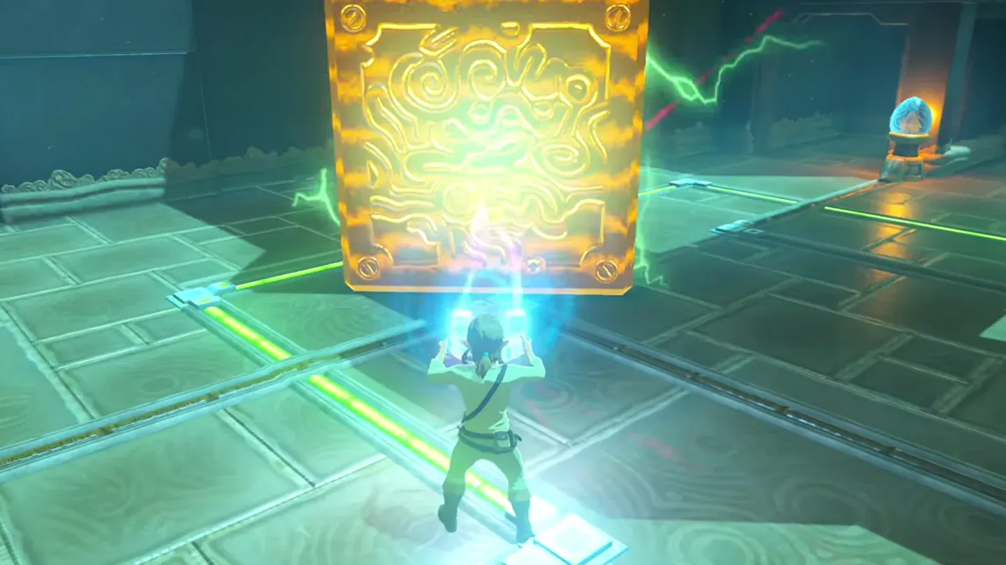 Link lowering the big metal cube into the gap near the back wall
