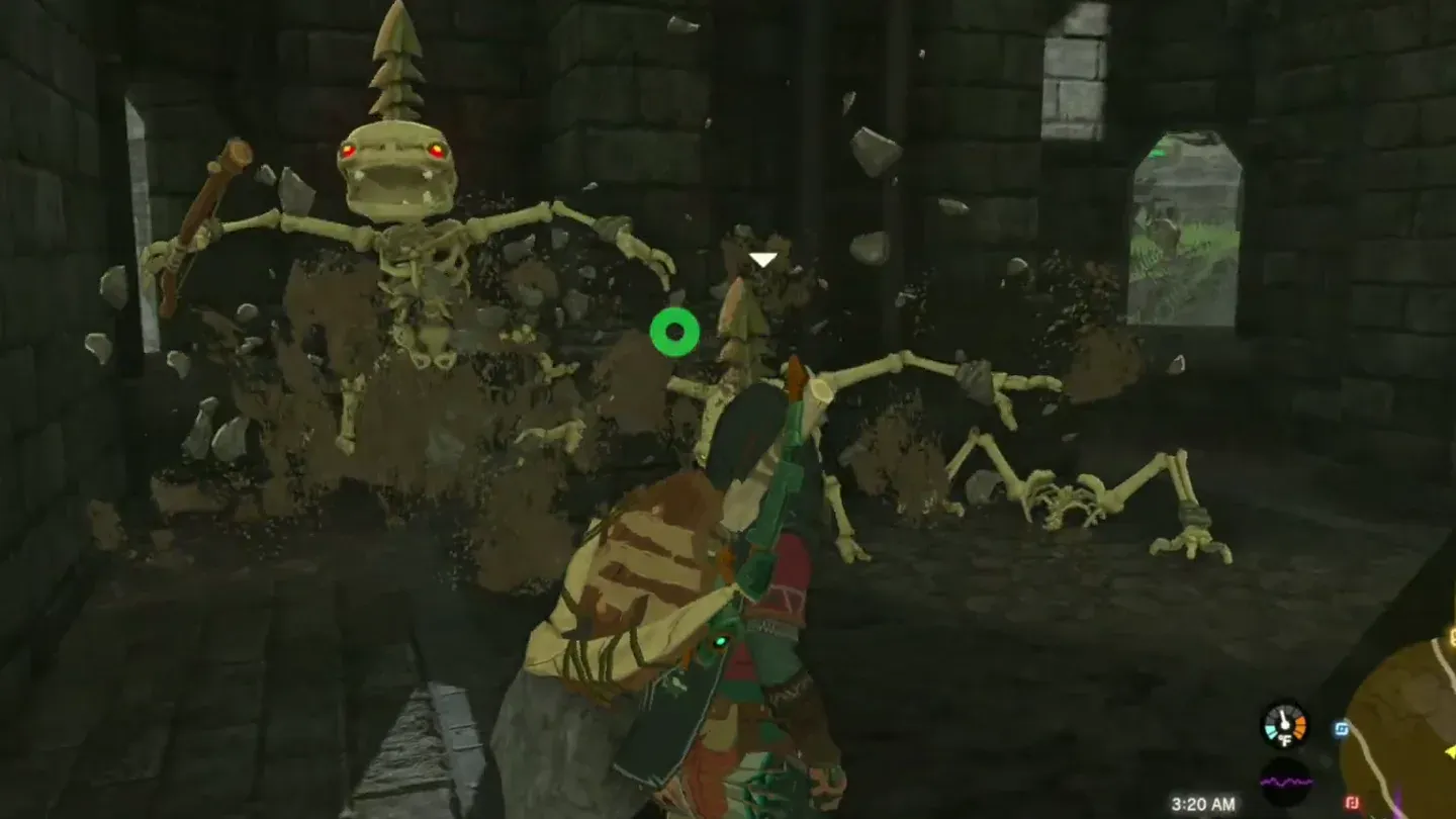 Two Stalkoblin skeletons with horns closing in on Link inside a dark stone ruin