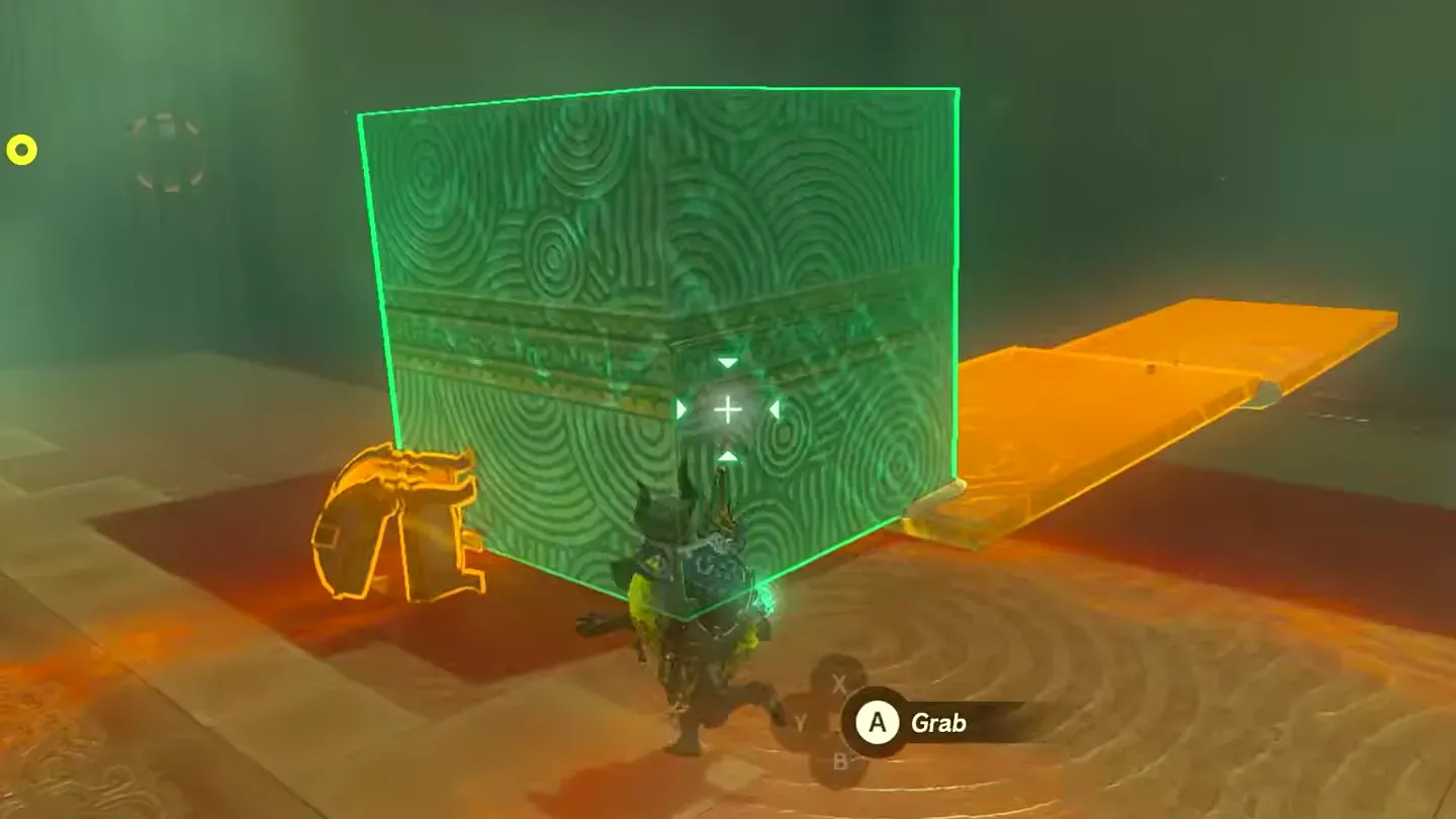 Link grabbing the large stone box next to an orange-outlined plank