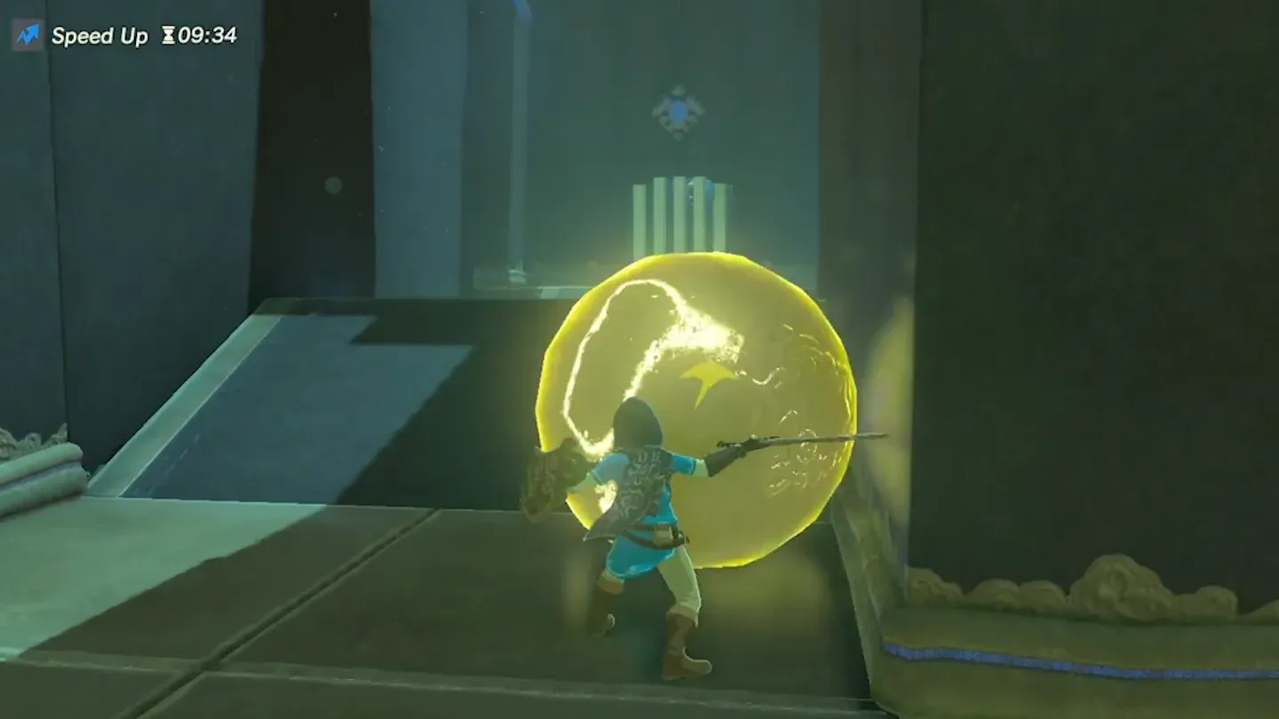 A boulder frozen by Stasis with a yellow force arrow near the ramp
