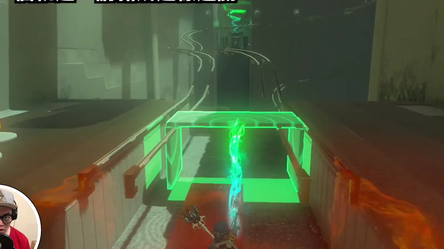 Ultrahand placing the E-shaped sled on the rails