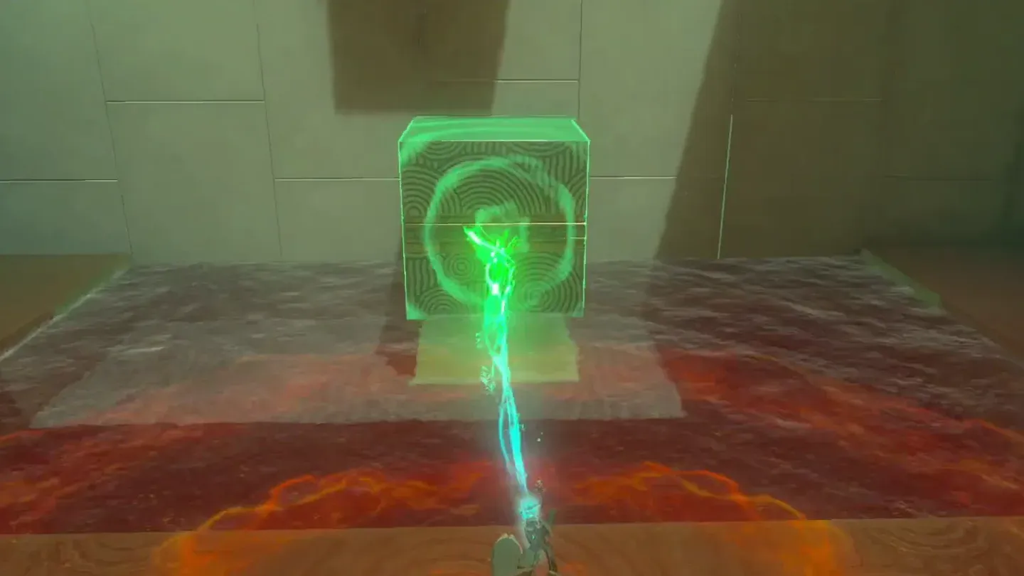 Ultrahand setting the metal cube down under the high ledge