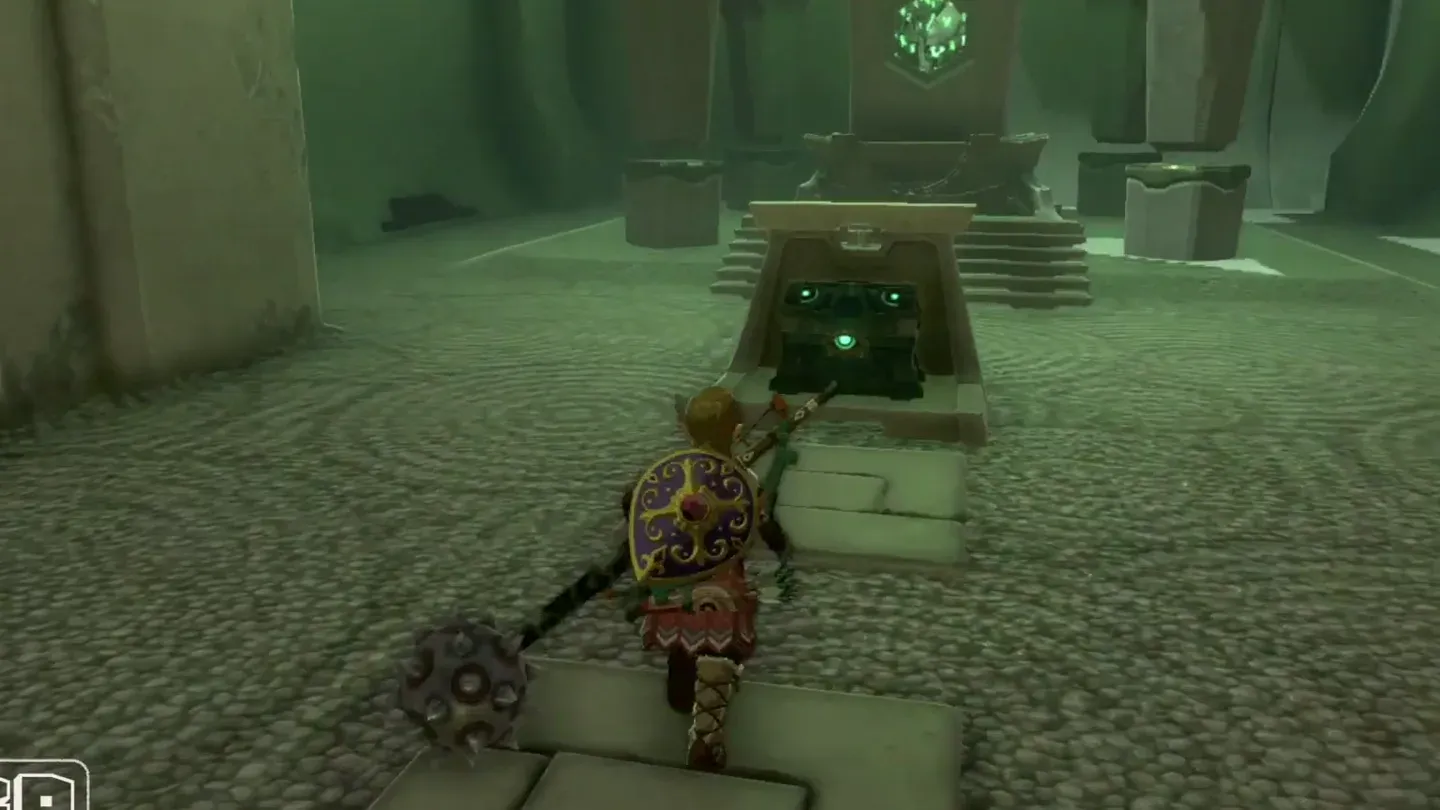Link walking up to the chest in the altar room