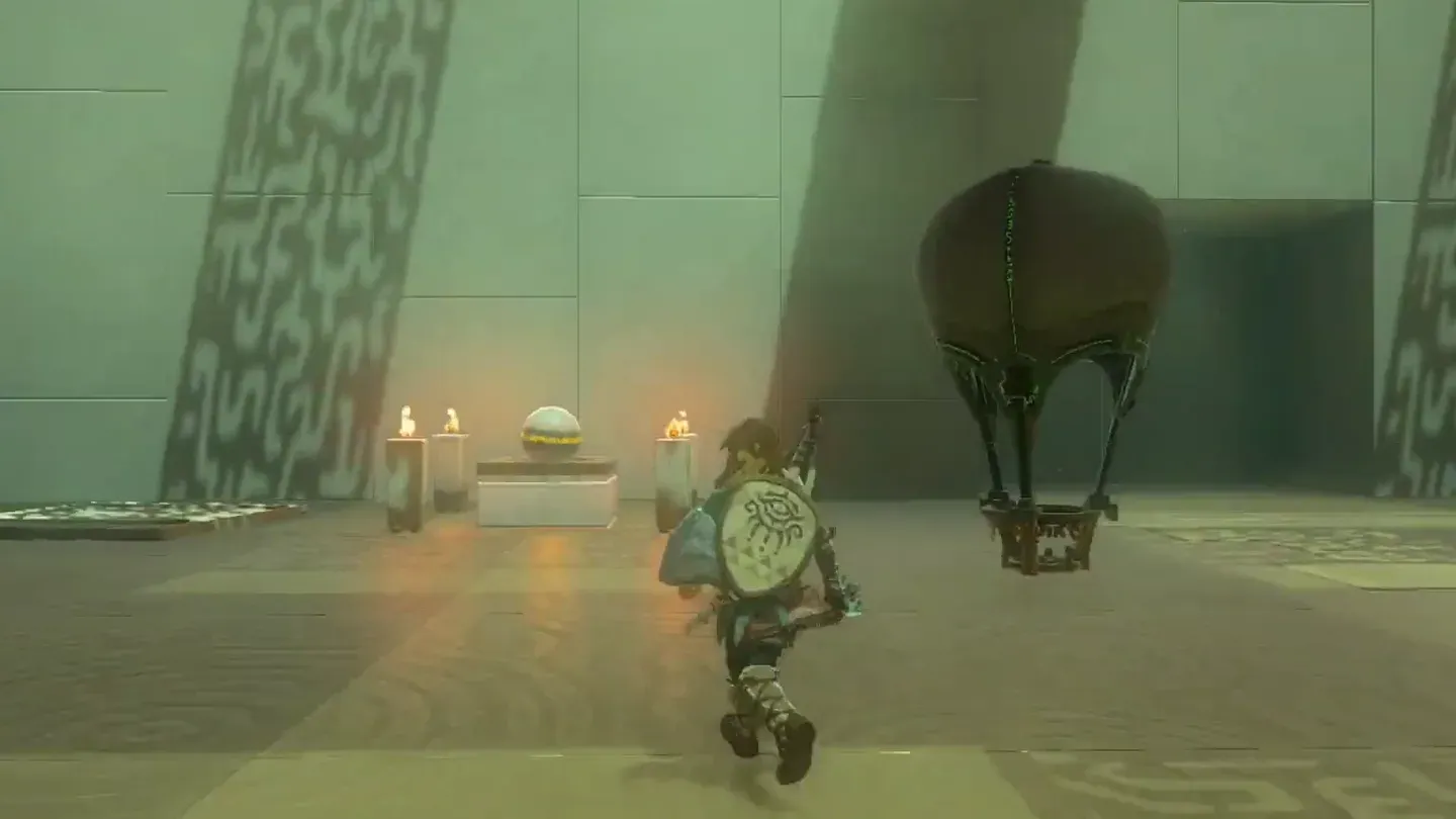The orb room from the upper level: a balloon, orbs on pedestals and lit pillars below