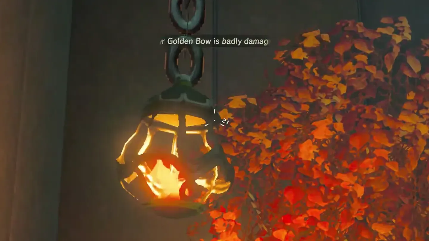 A lowered lamp swinging into the vines on the wall