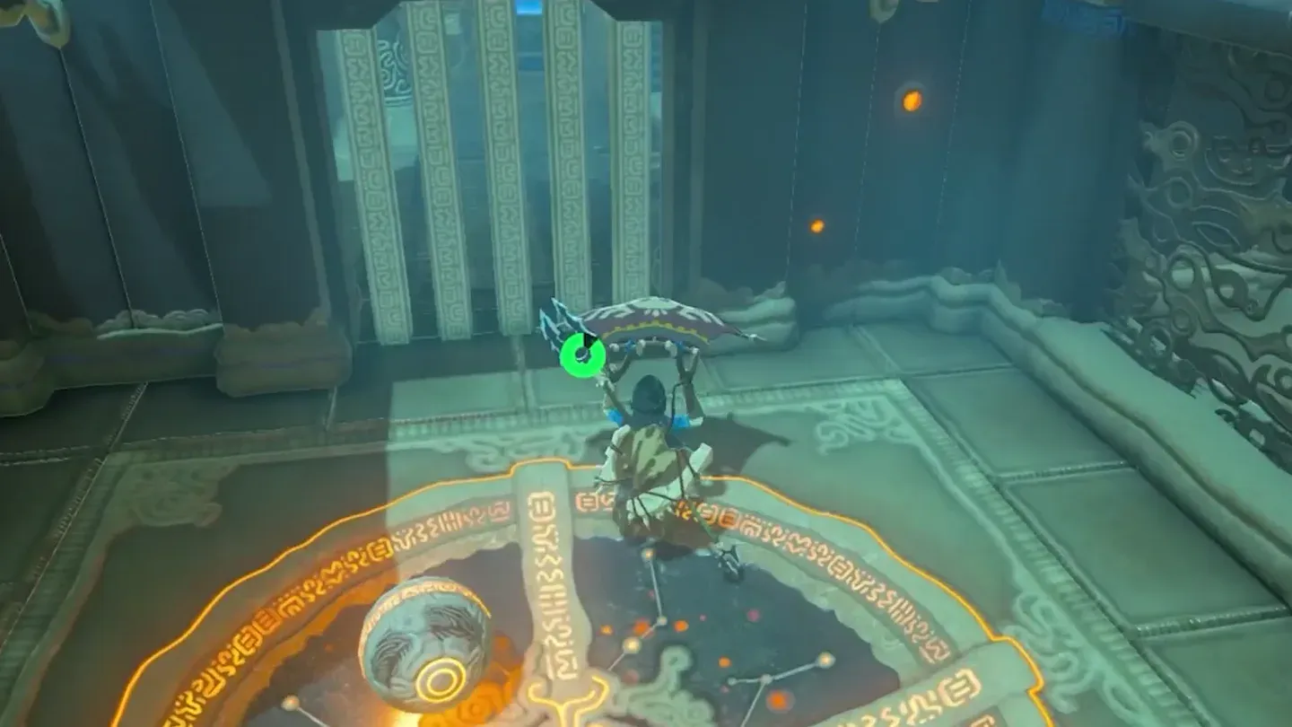 The orb sitting in the round floor receptacle