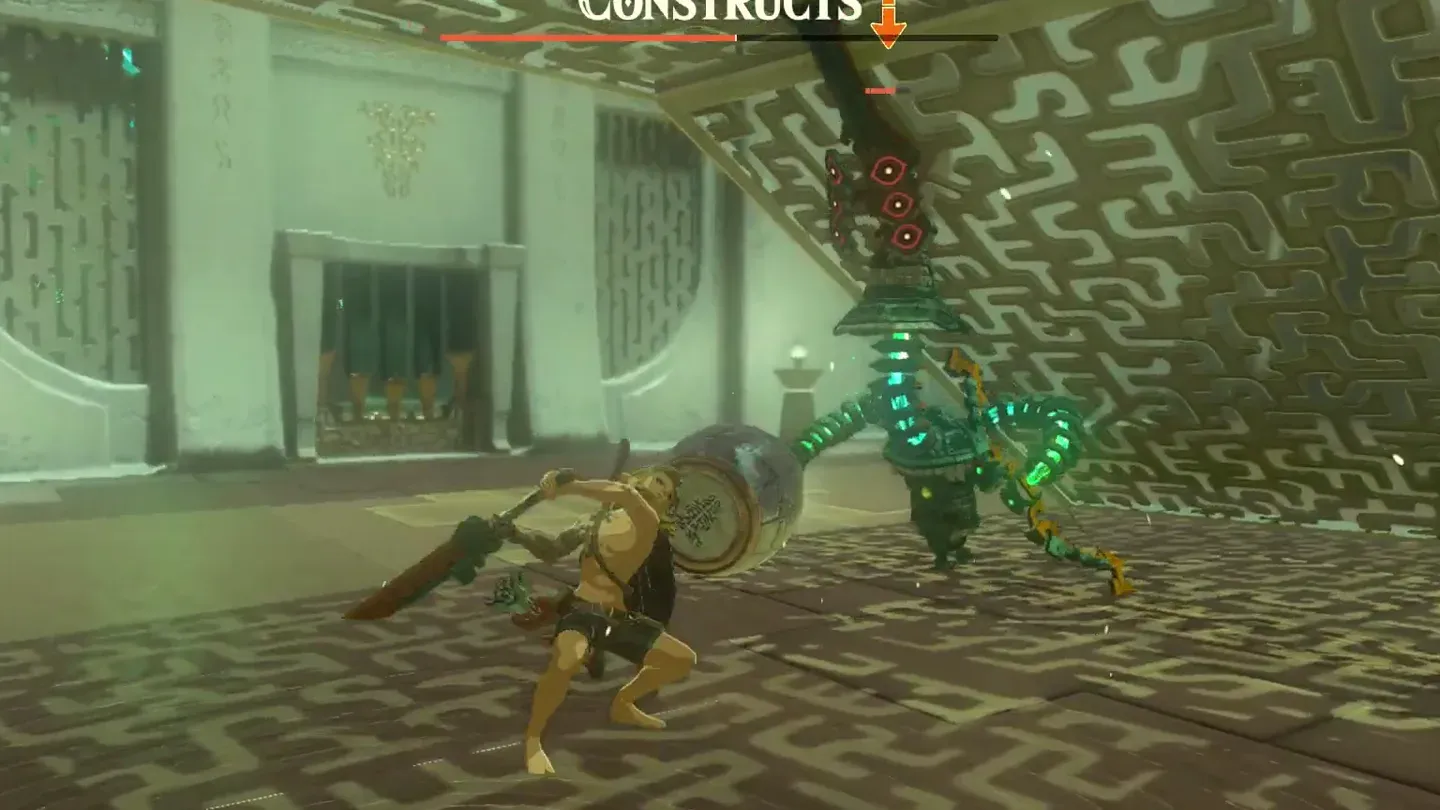 Link fighting the Captain Construct with its barrel hammer