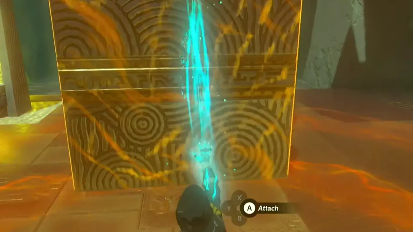 Ultrahand setting the large metal cube onto the platform