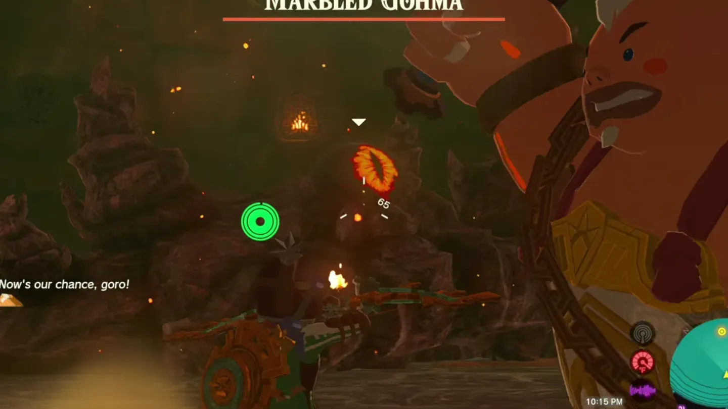 Yunobo about to charge at Marbled Gohma's leg