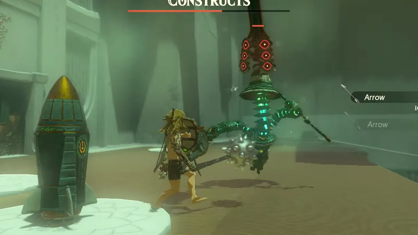 A Rocket standing on the floor while Link fights a Captain Construct