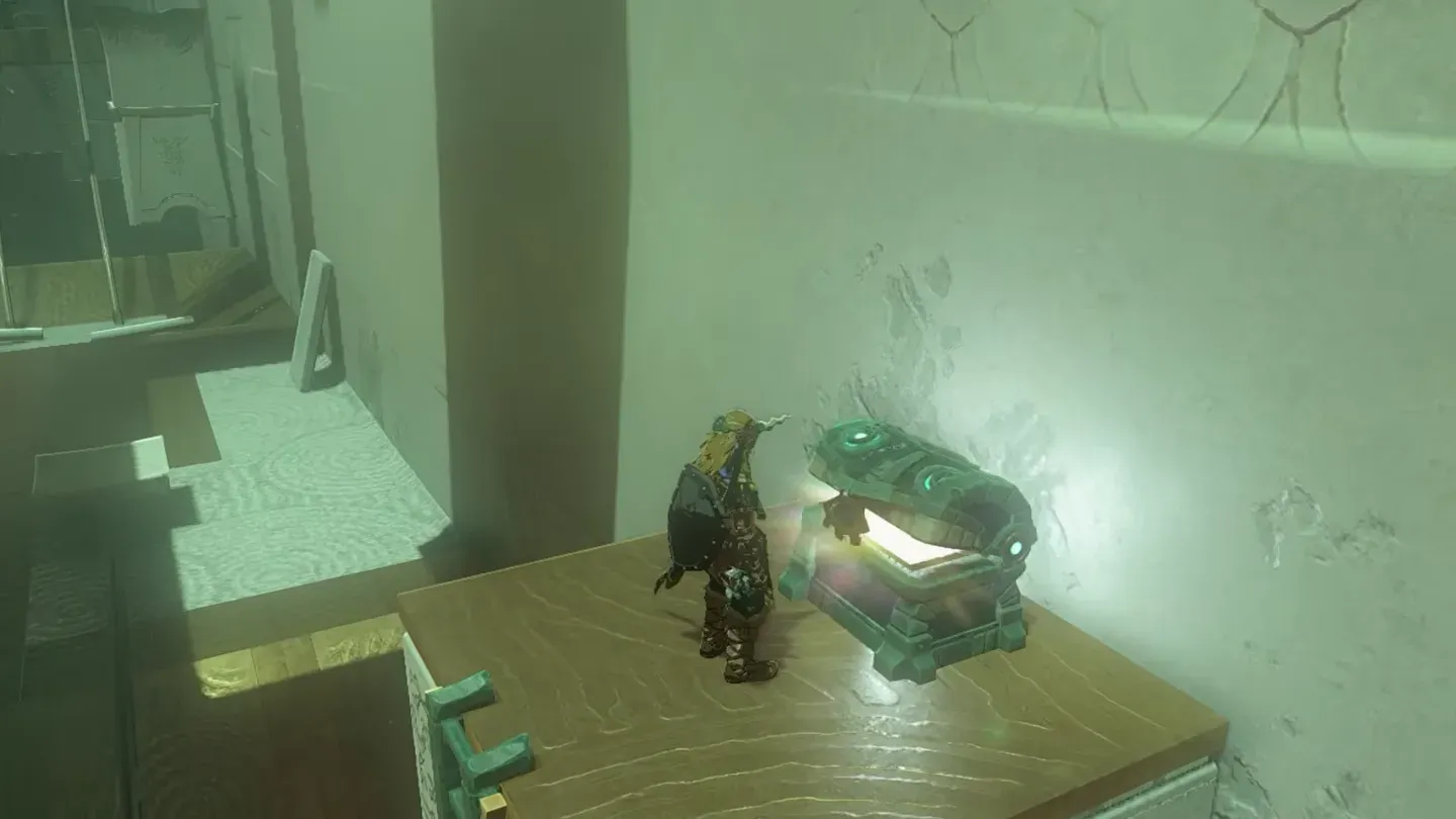 Link opening the chest on top of the tall platform