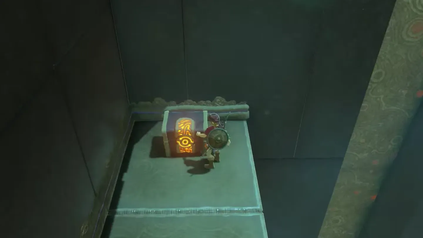 Link opening the treasure chest on the hidden ledge
