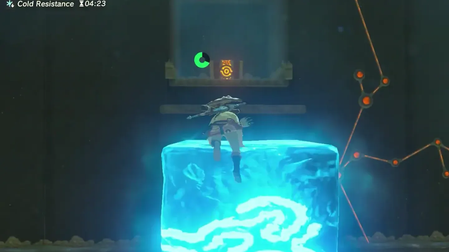 Link climbing an ice pillar beside the chest ledge