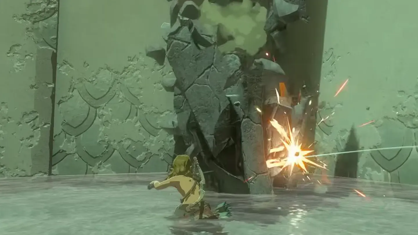 Link smashing a cracked stone column with the boulder hammer