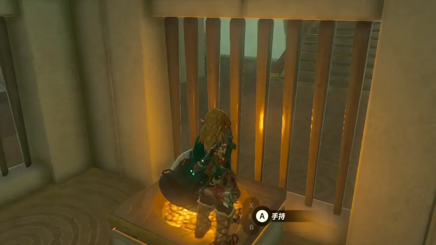 Link taking the orb from behind the caged door
