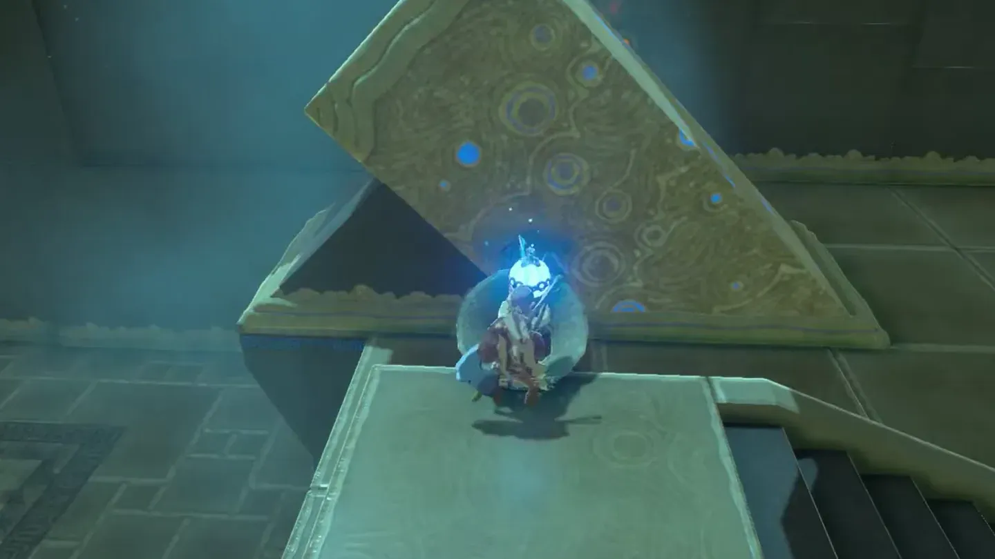 Link holding a round bomb above the pipe of the right-hand launcher
