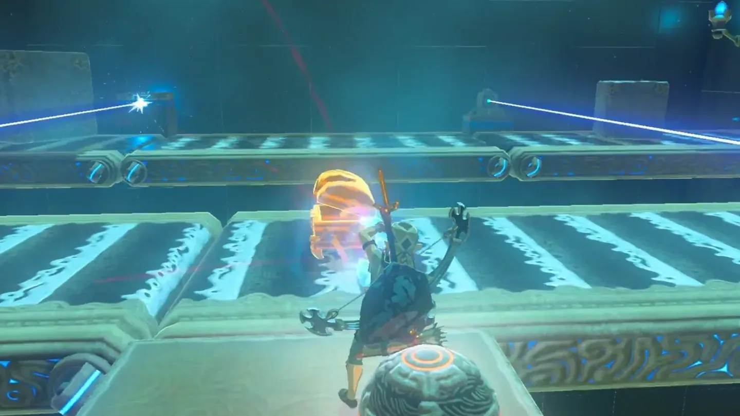 Link pulling the chest off the far conveyor belt with Magnesis