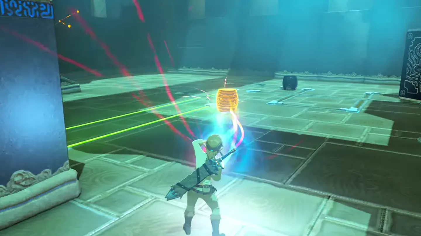 Link carrying the metal chest across the room with Magnesis