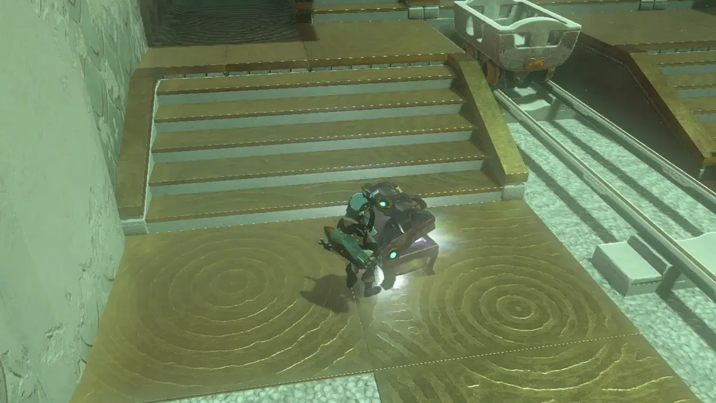 Link opening the chest at the end of the rail