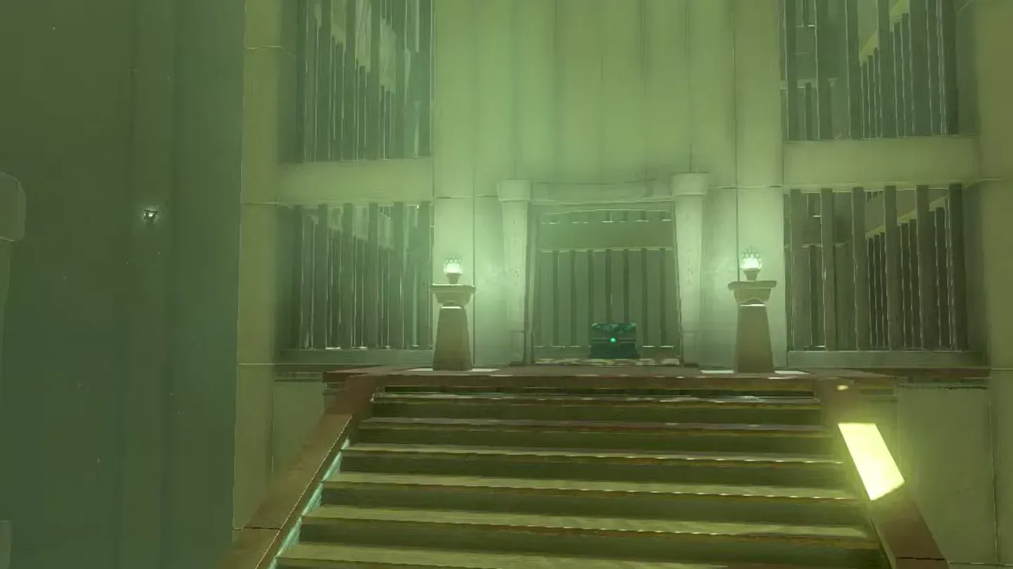 The side gate open with a chest at the top of the stairs
