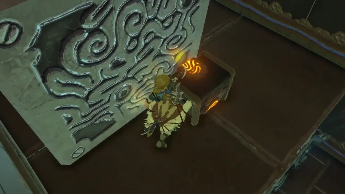 Link opening the chest inside the fire-sealed pillar