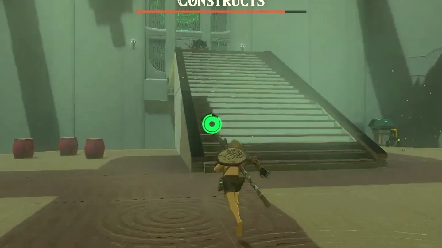 Link running toward the grate at the back of the room