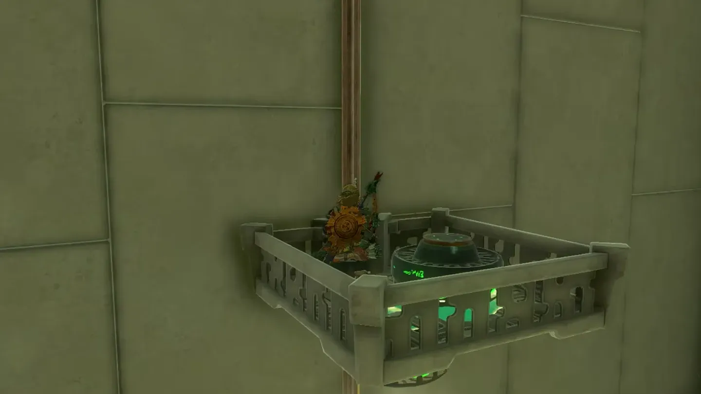 Link riding the cart as it rises