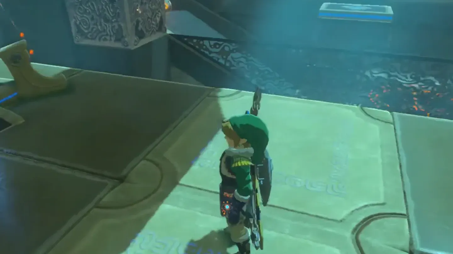 Link standing on the tilted platform beside the entrance