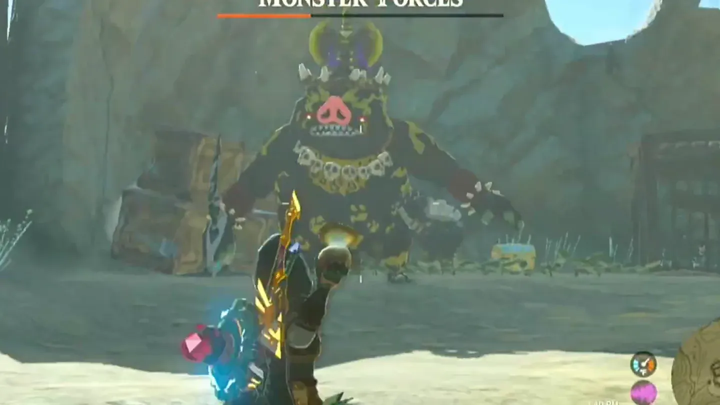 A near-black Black Boss Bokoblin with yellow markings facing Link inside a wooden fort