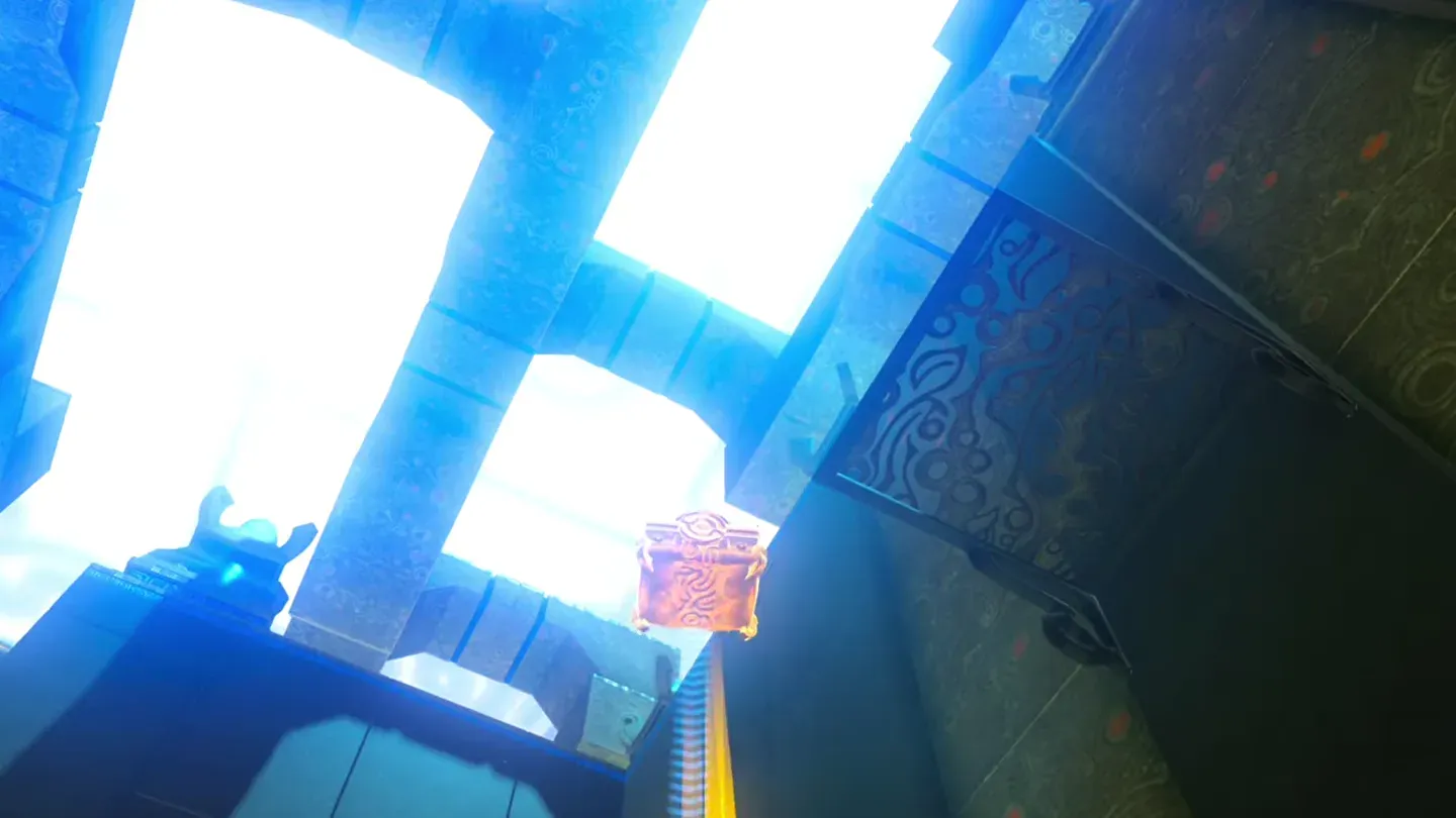 Magnesis pulling the metal chest down from the ledge