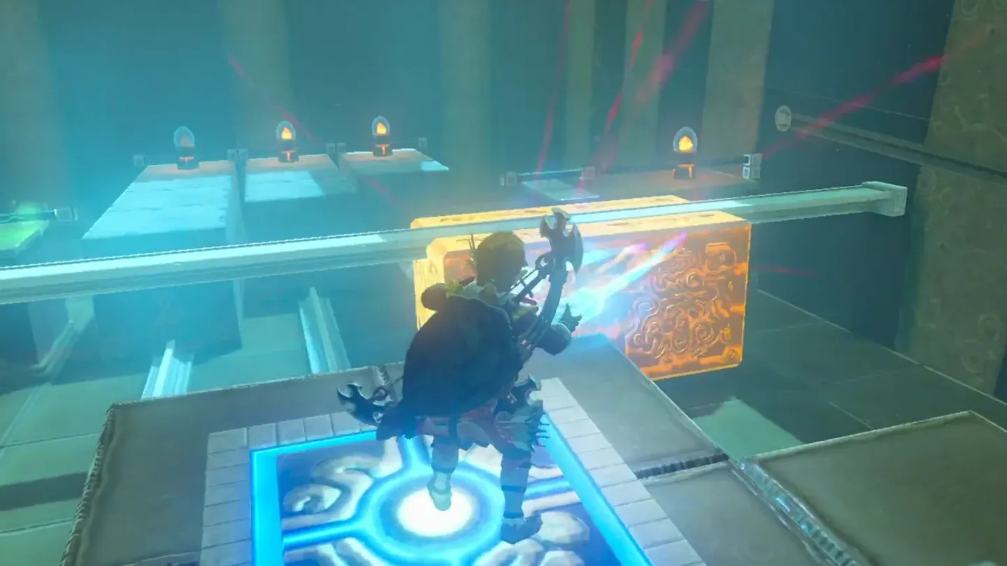 Link on the pressed switch pulling the metal cuboid across