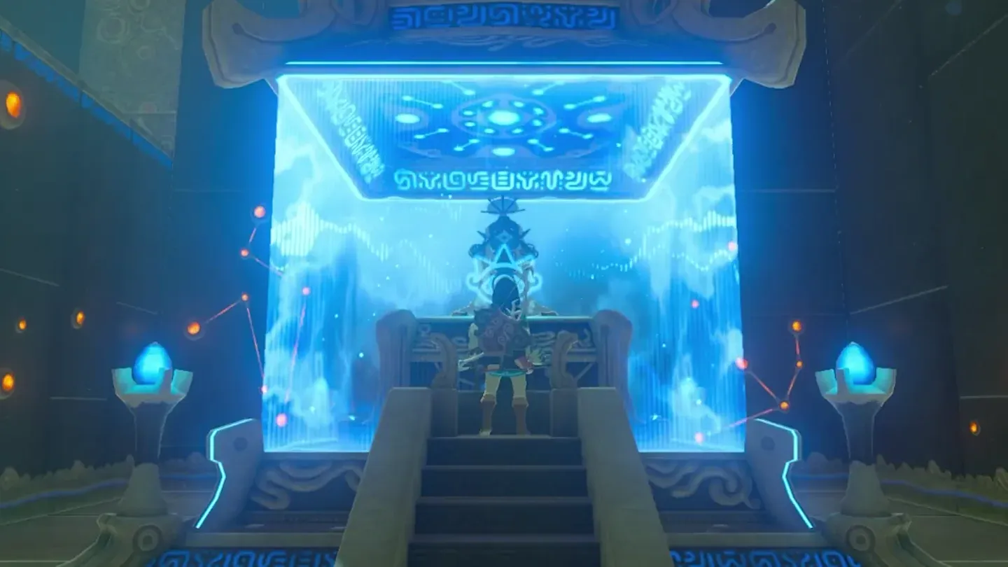 The monk seated inside the glowing blue barrier on the pedestal