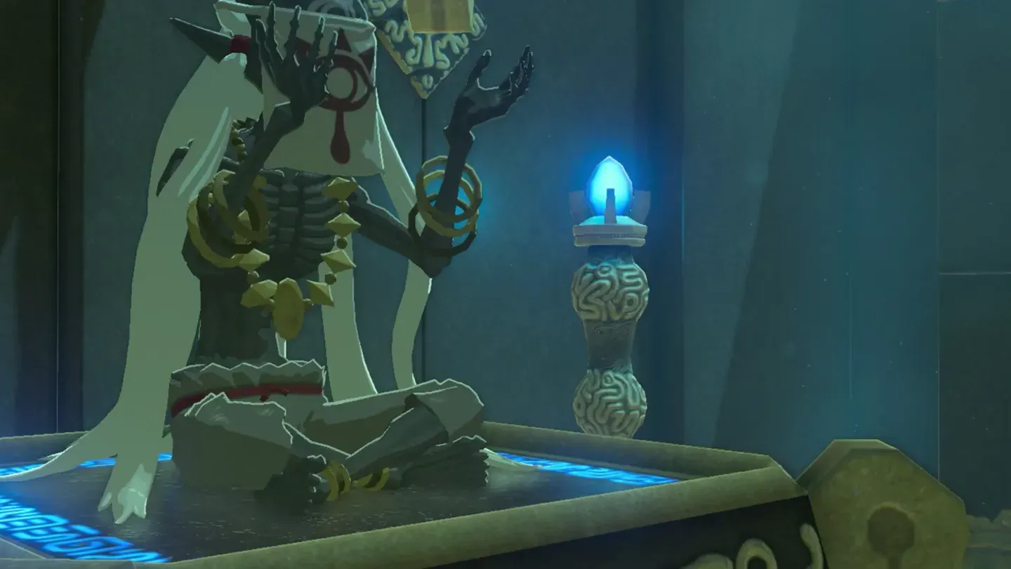 The monk Akh Va'quot seated on the pedestal
