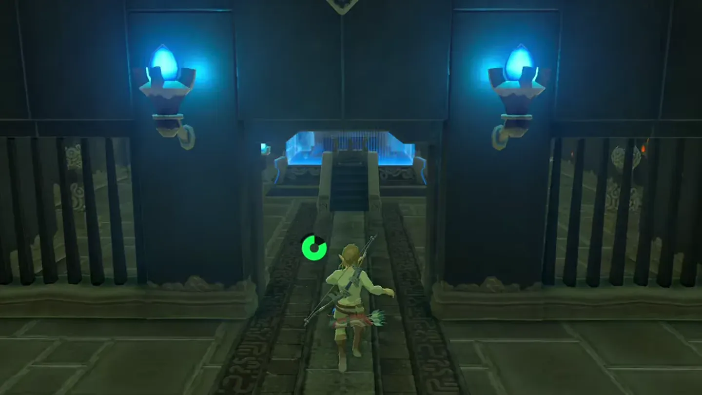 Link running through the opened gate toward the monk