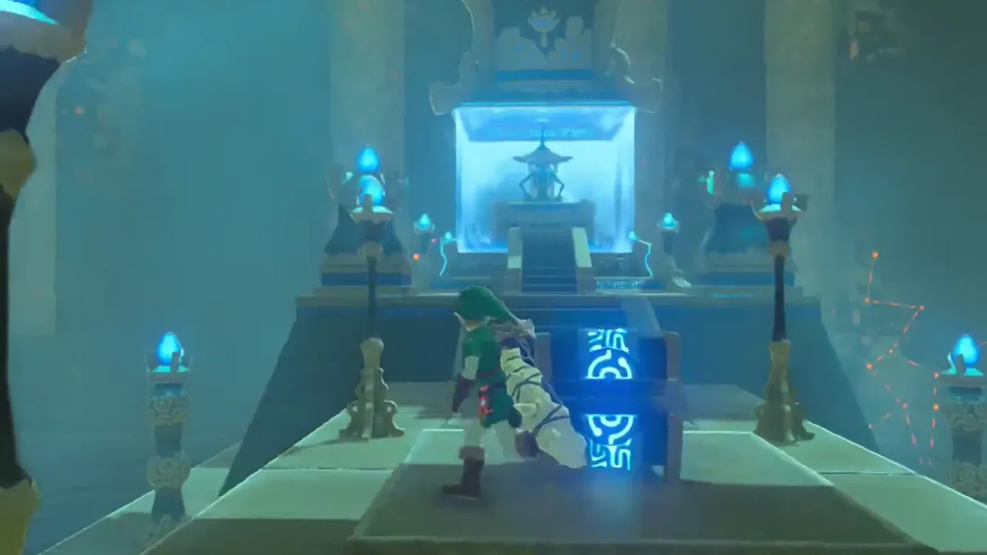 Link beside the opened treasure chest on the path