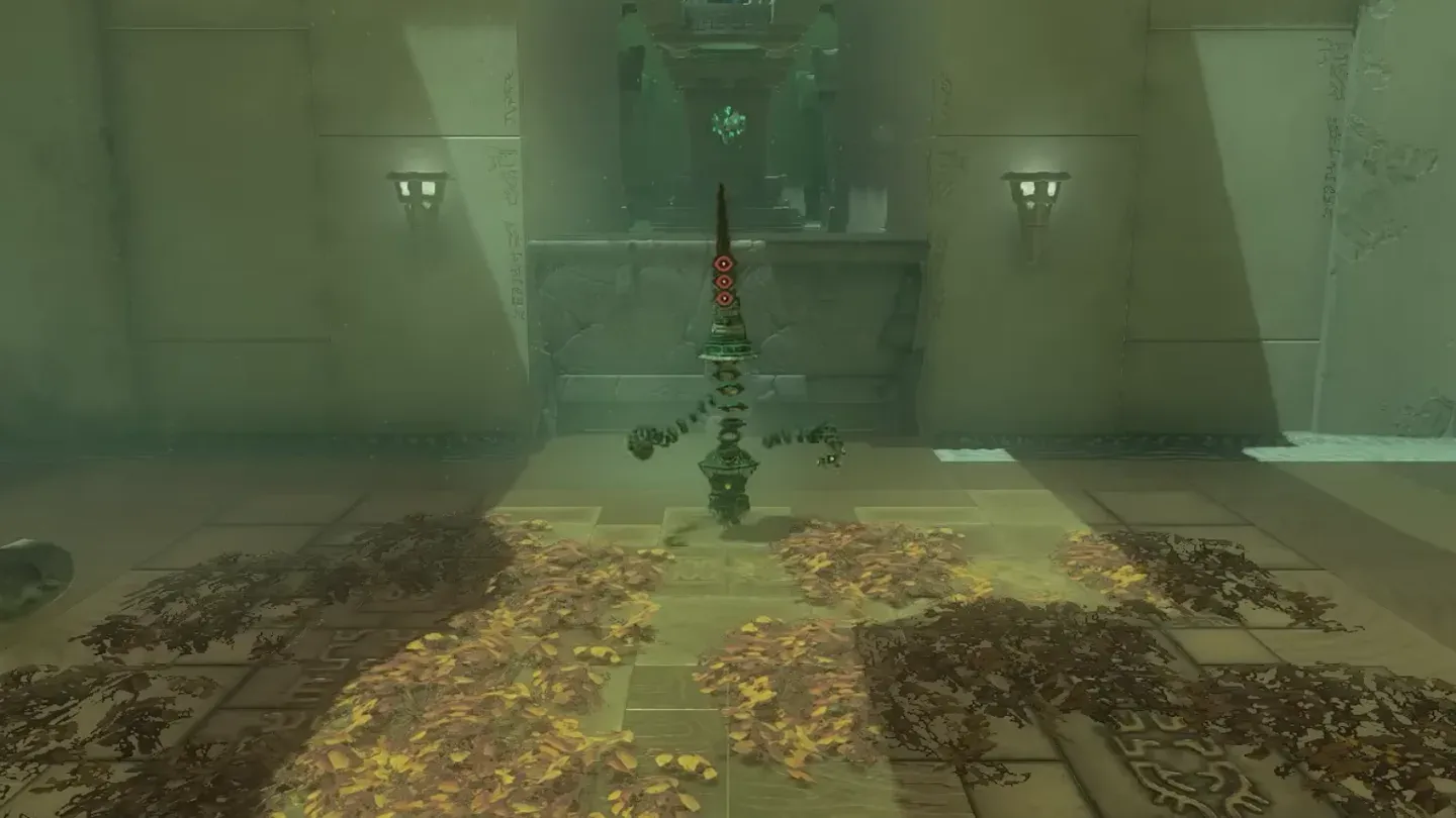 Captain Construct I standing behind a floor covered in dry leaves
